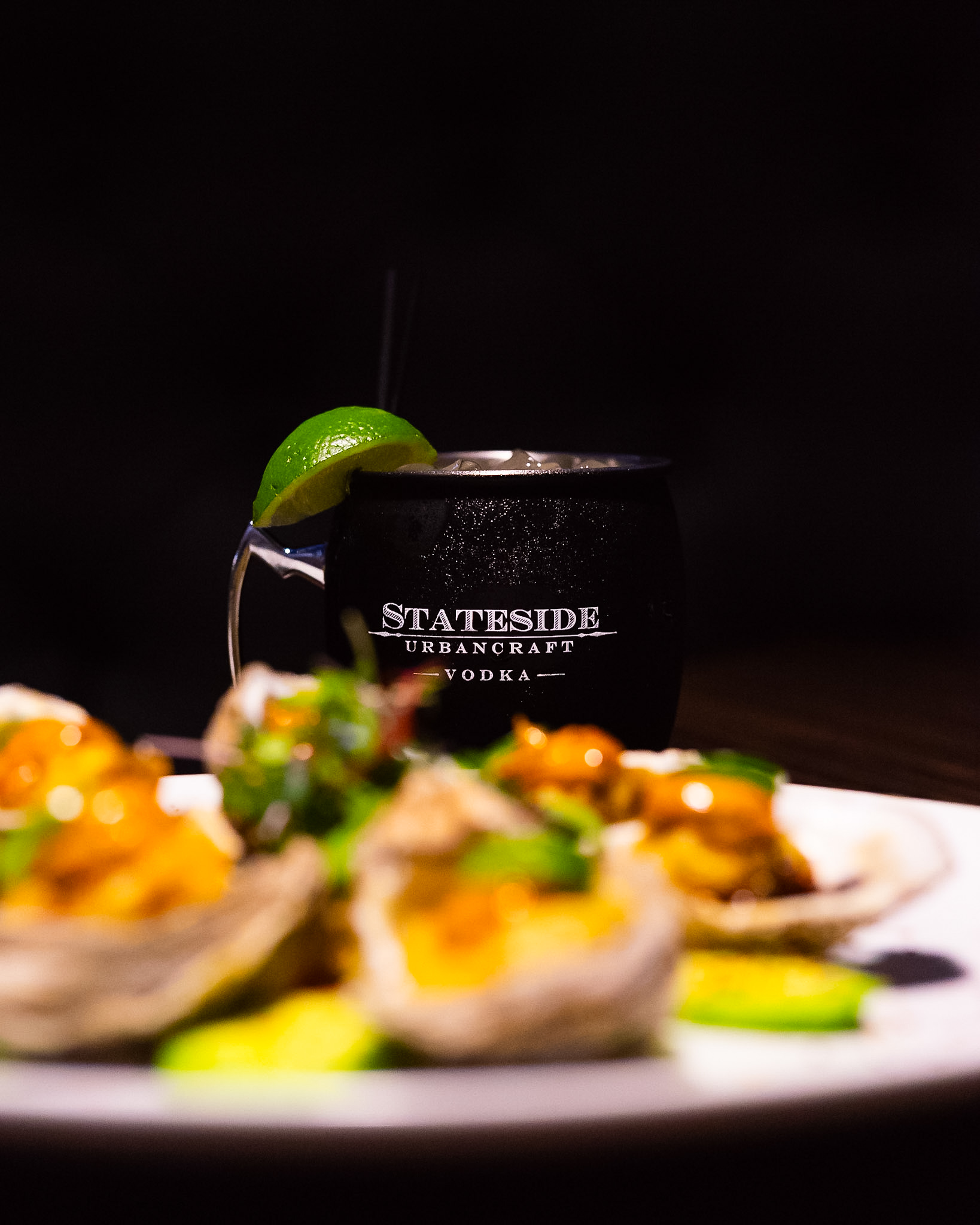 Oyster bar bites with a Stateside vodka mule