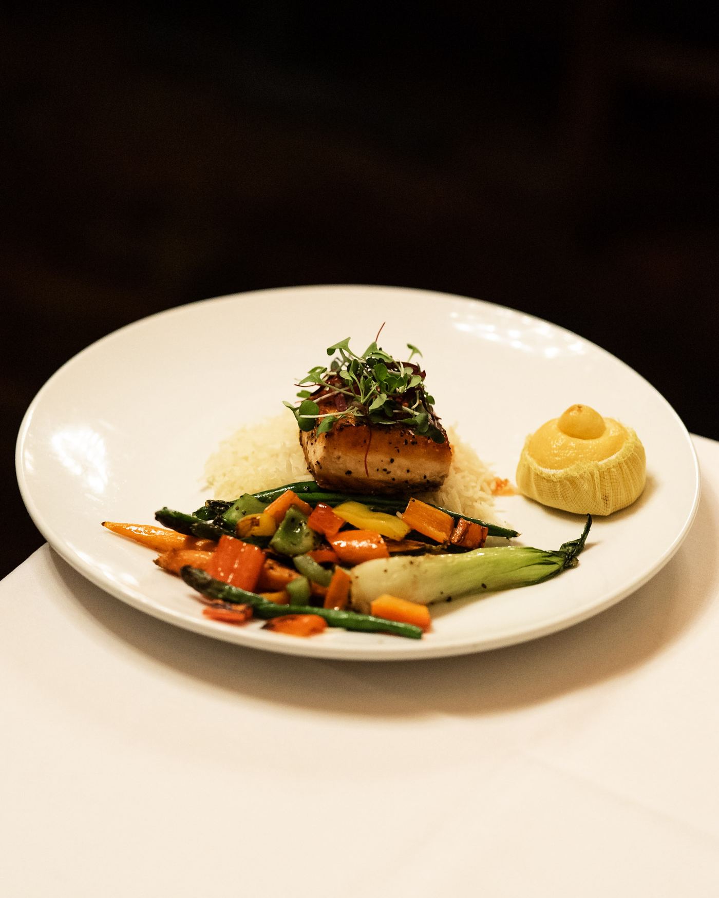Glazed fish fillet with charred vegetables and rice