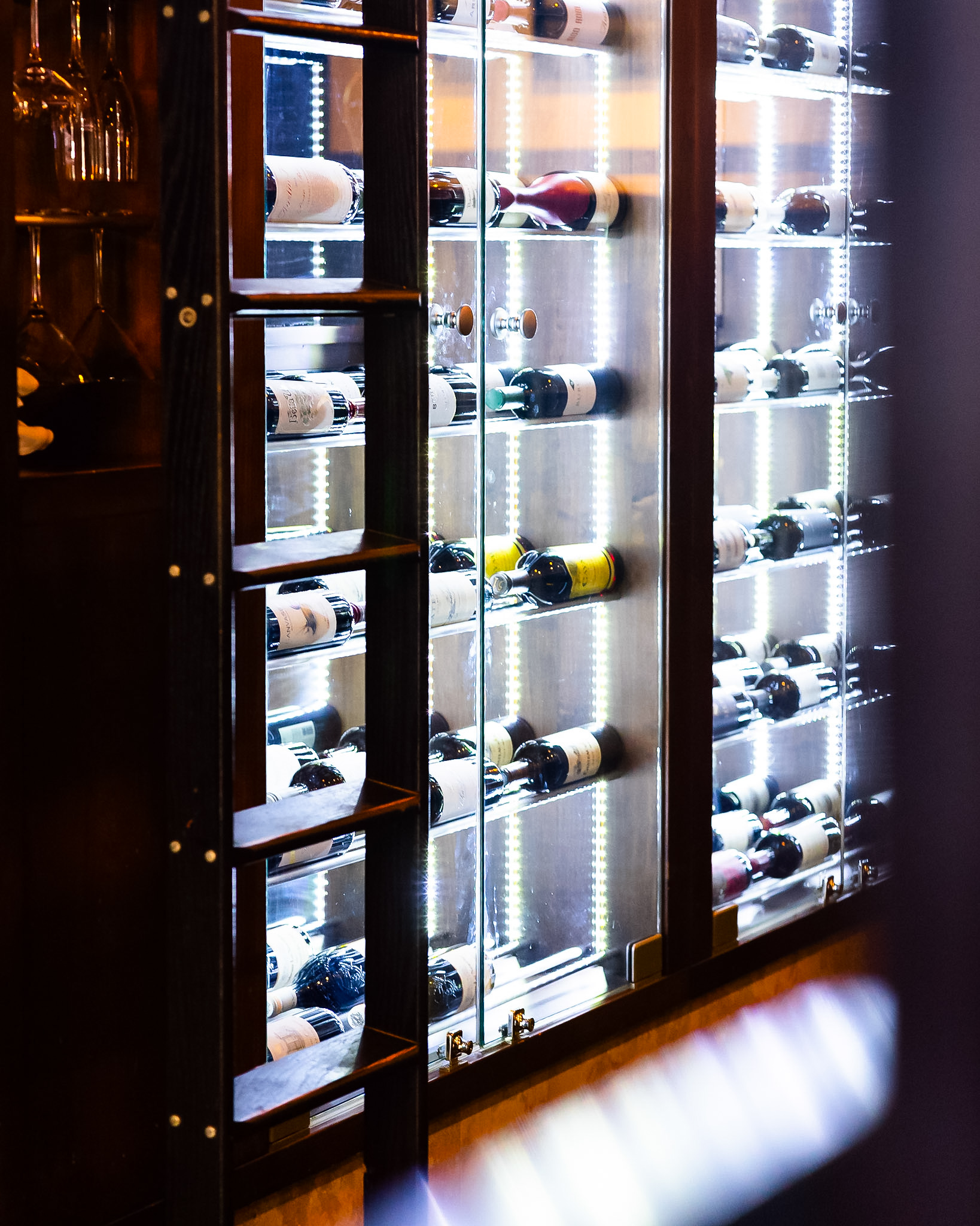 Close-up of the illuminated wine wall